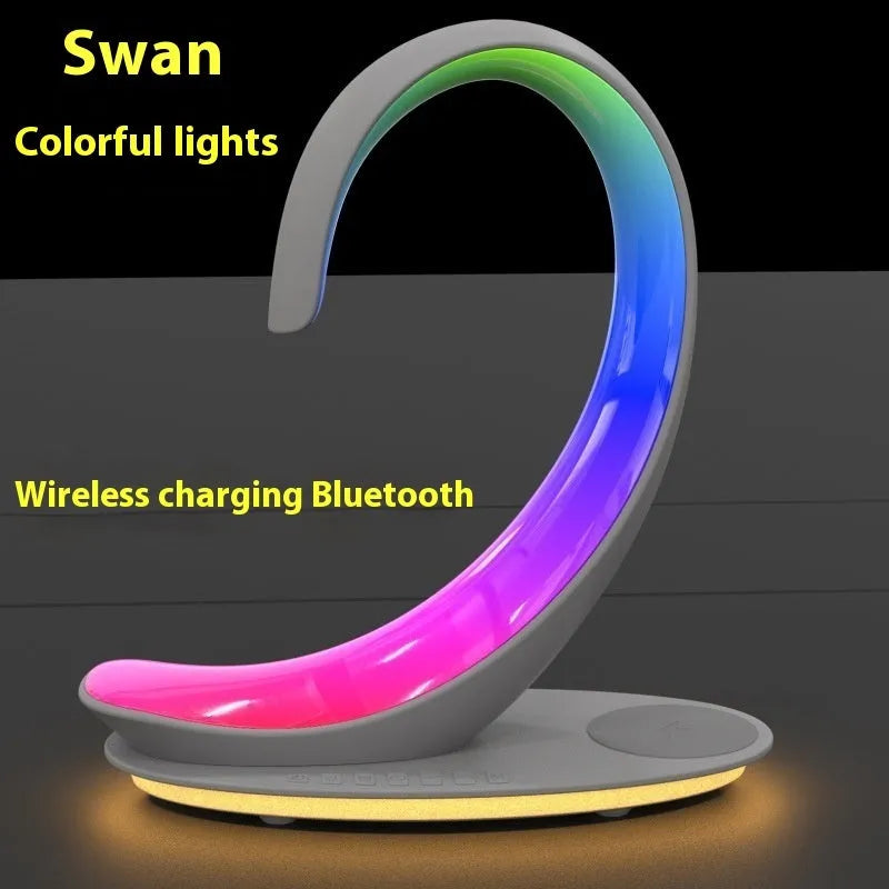 White swan shaped desktop atmosphere light with colourful LEDs and built-in Bluetooth speaker