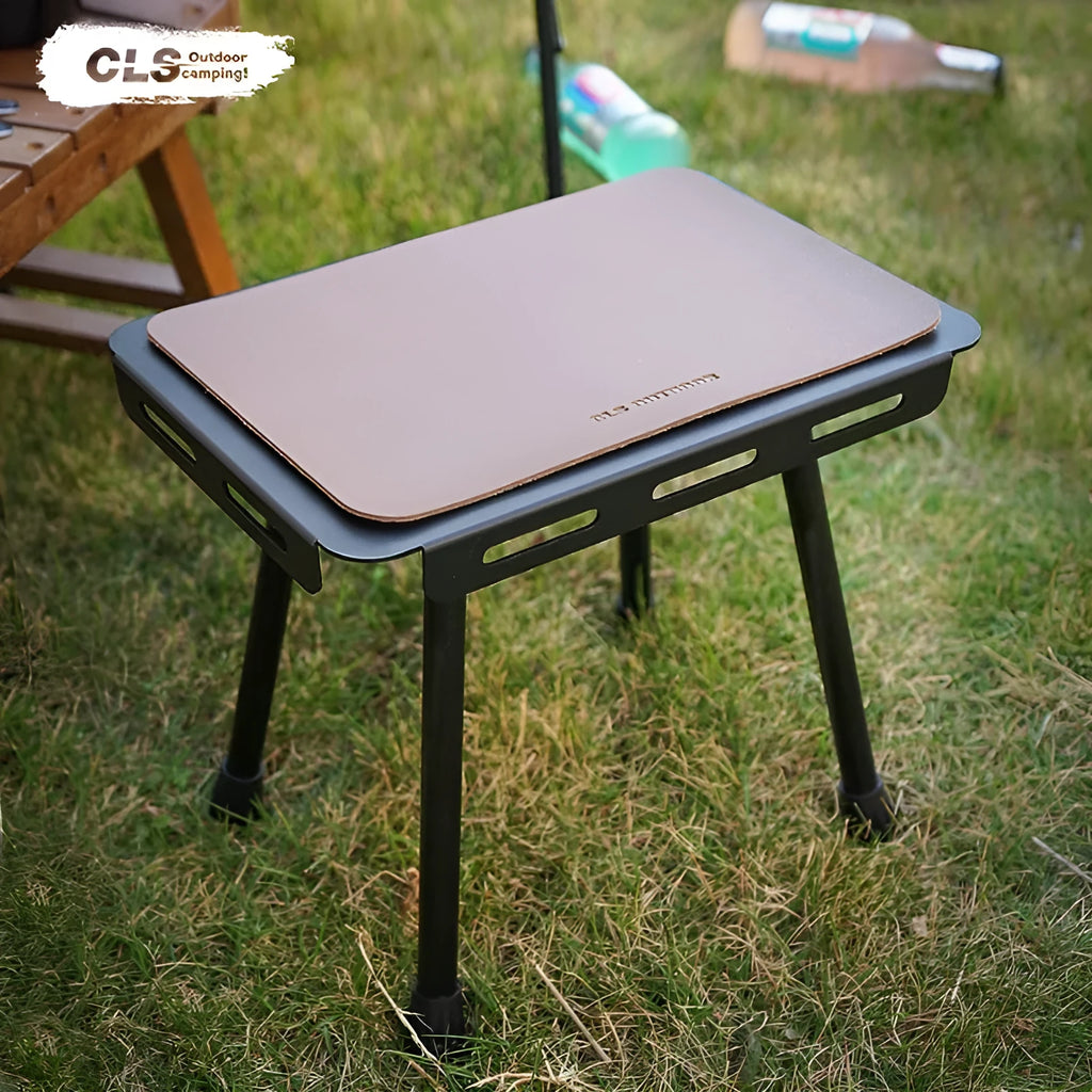 CLS aluminium folding camping stool with PU mat cushion, shown converted into a small side table.