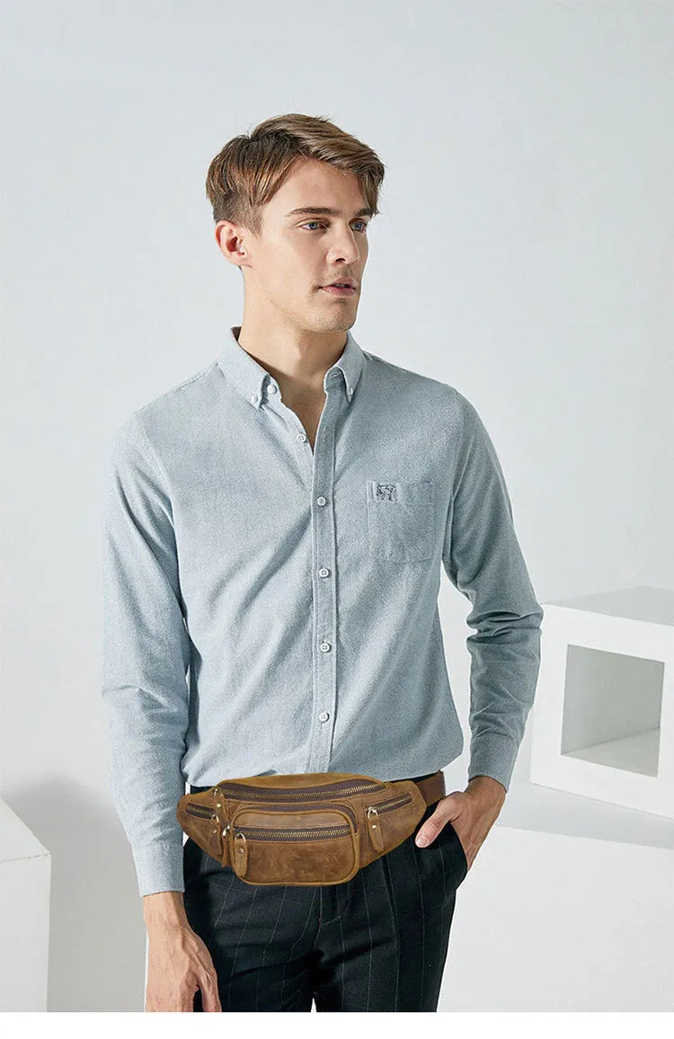 Dark crazy horse cowhide leather messenger bag with single shoulder strap showing 32cm width.