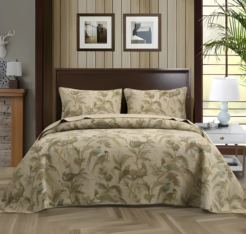 Blue American flower and bird pattern quilted cotton bedspread set on a bed
