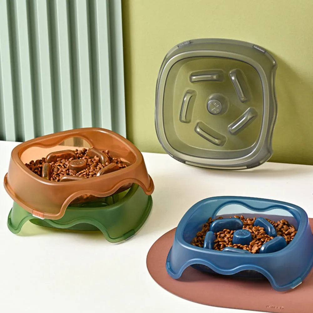 Plastic dog slow feeder bowl with anti-choking ridges in blue, grey, green, and orange colour options