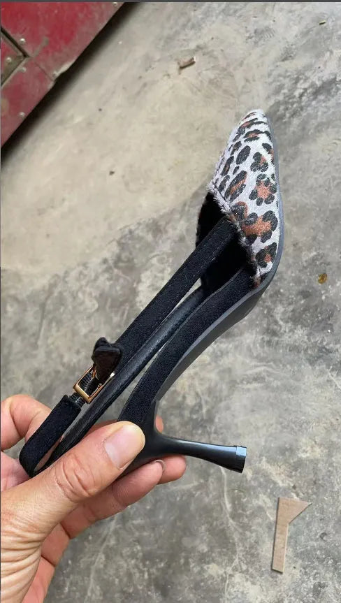 Women's leopard print suede sandals with scattered pointed toe design on size display