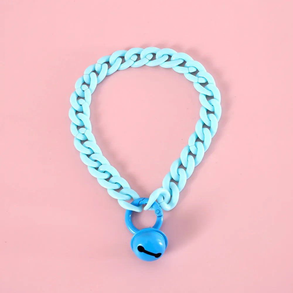 Adjustable plastic pet collar in macaron candy colours on a white background.