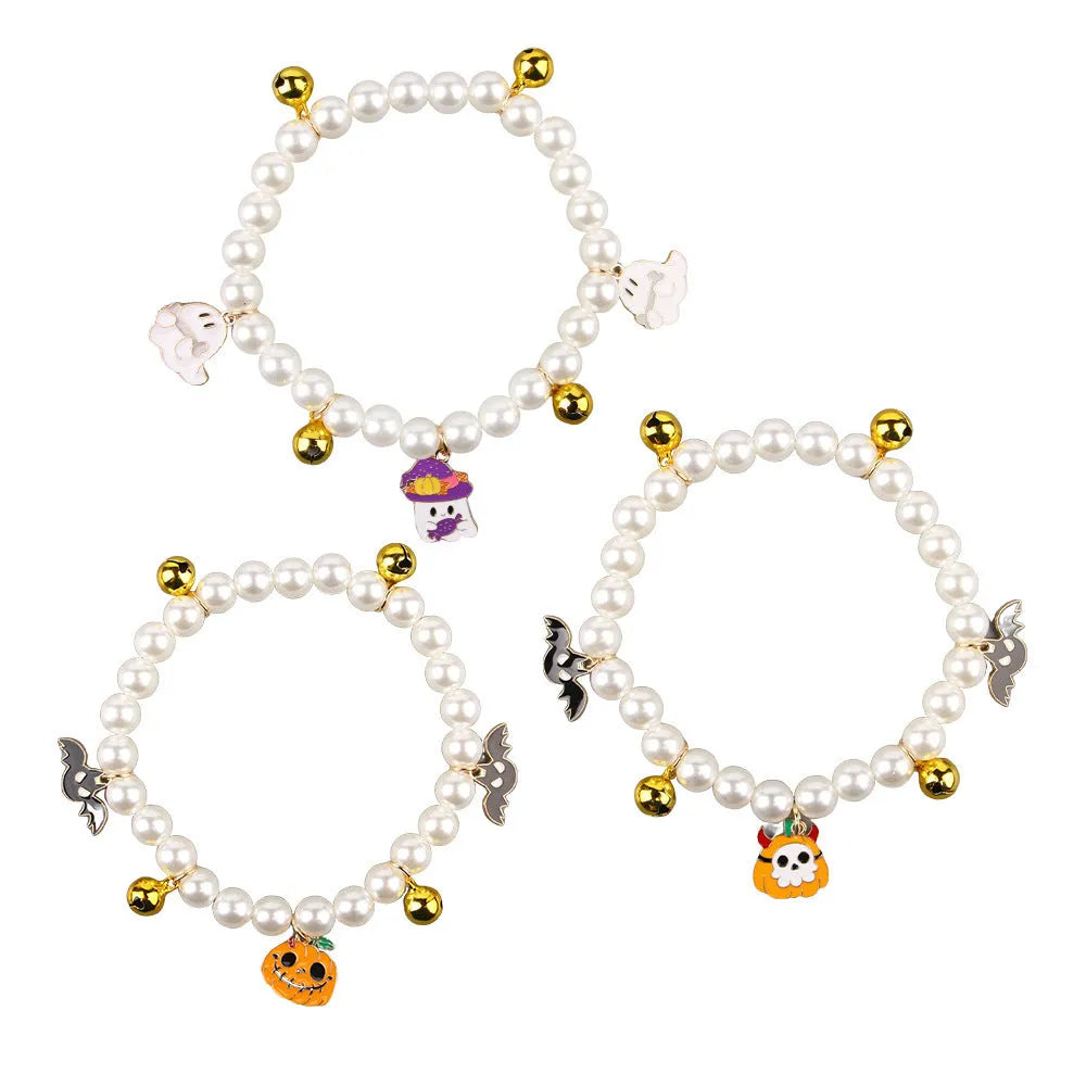 Halloween pet collar decoration with simulated pearl beads and a pumpkin charm.