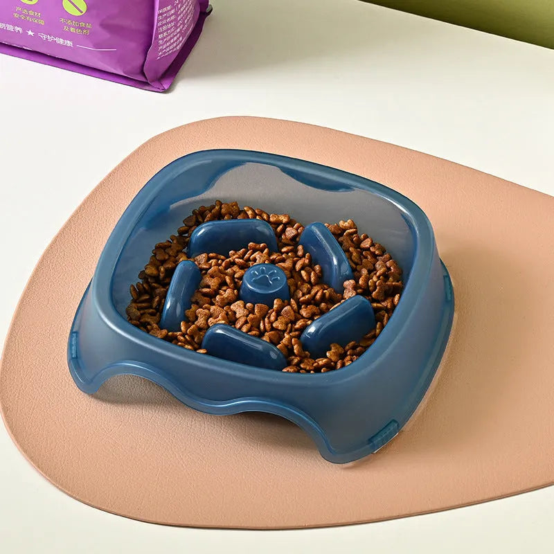Plastic dog slow feeder bowl with anti-choking ridges in blue, grey, green, and orange colour options