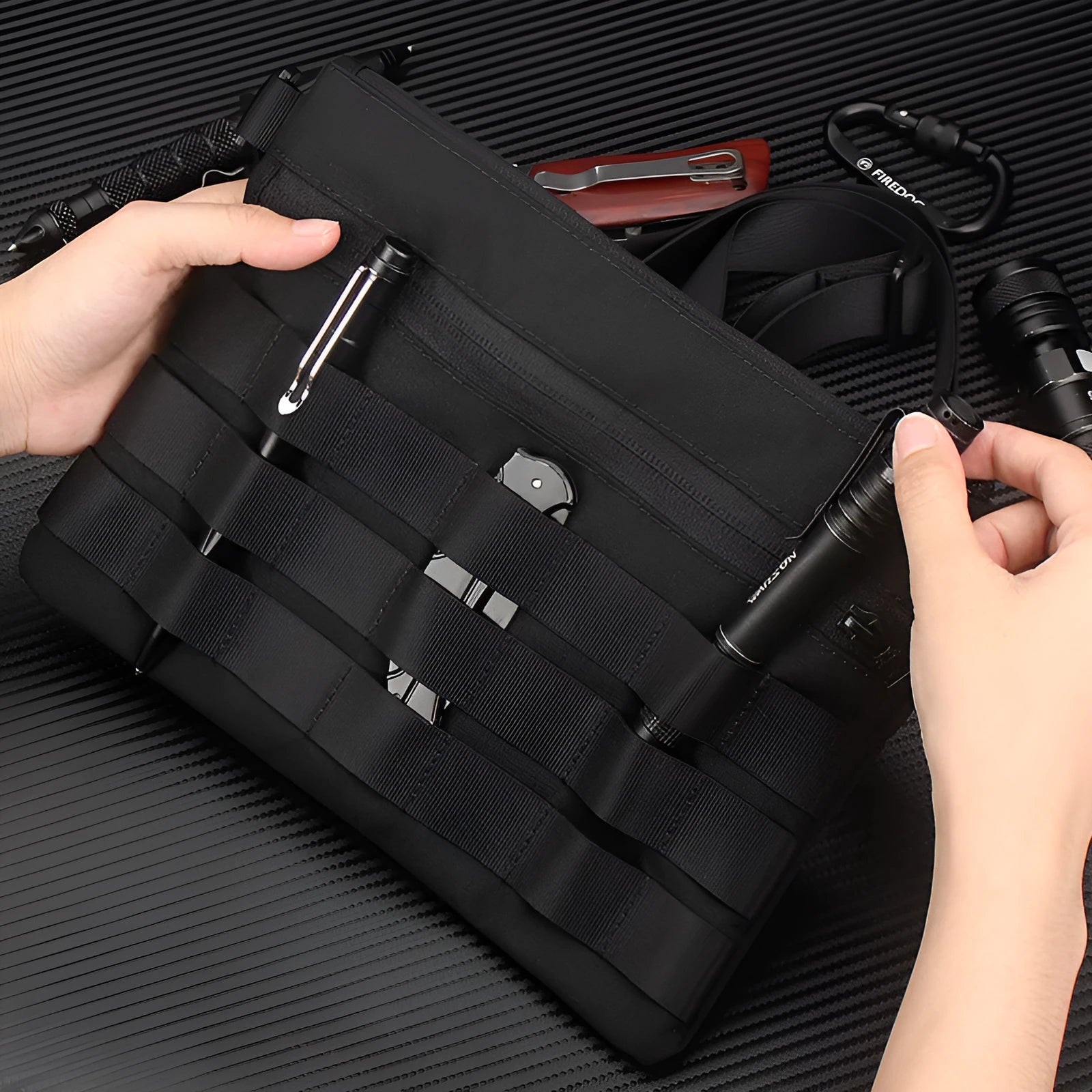 Black military-style Oxford cloth waist bag shown closed, measuring 18cm.