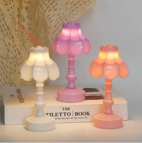 Retro pagoda-shaped small night lamp in light purple colour with geometric design.