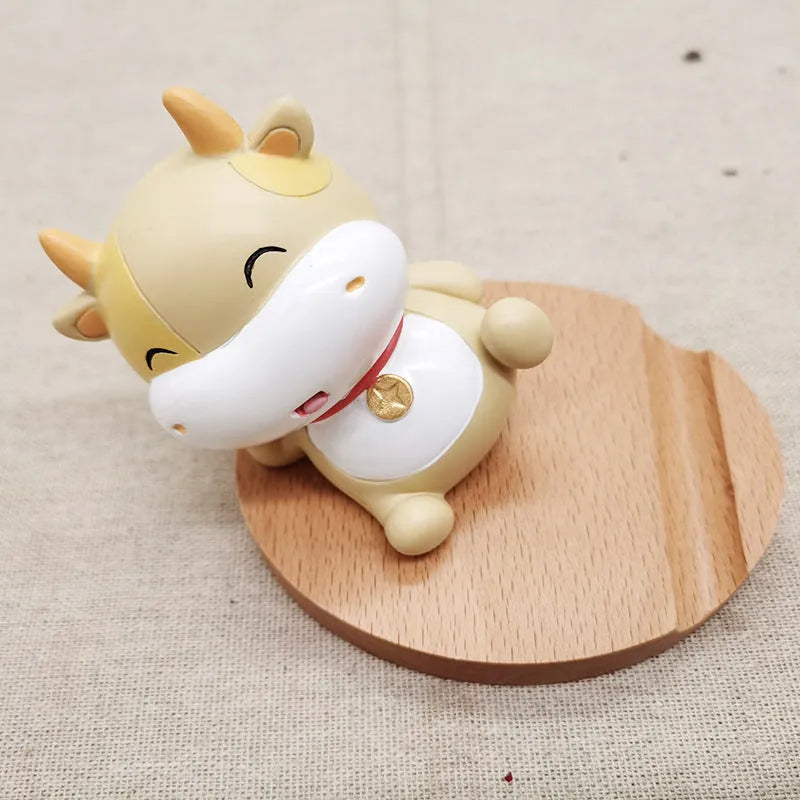 Resin animal-themed mobile phone holder with lazy bracket design for desk organisation