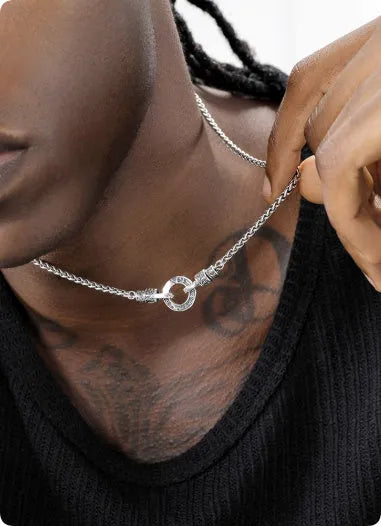 Delicate S925 sterling silver clavicle necklace with a small pendant on a fine chain.