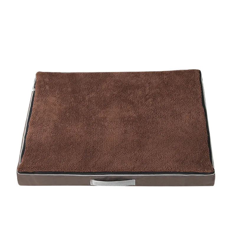 Brown removable washable memory sponge dog mattress pad on a wooden floor.