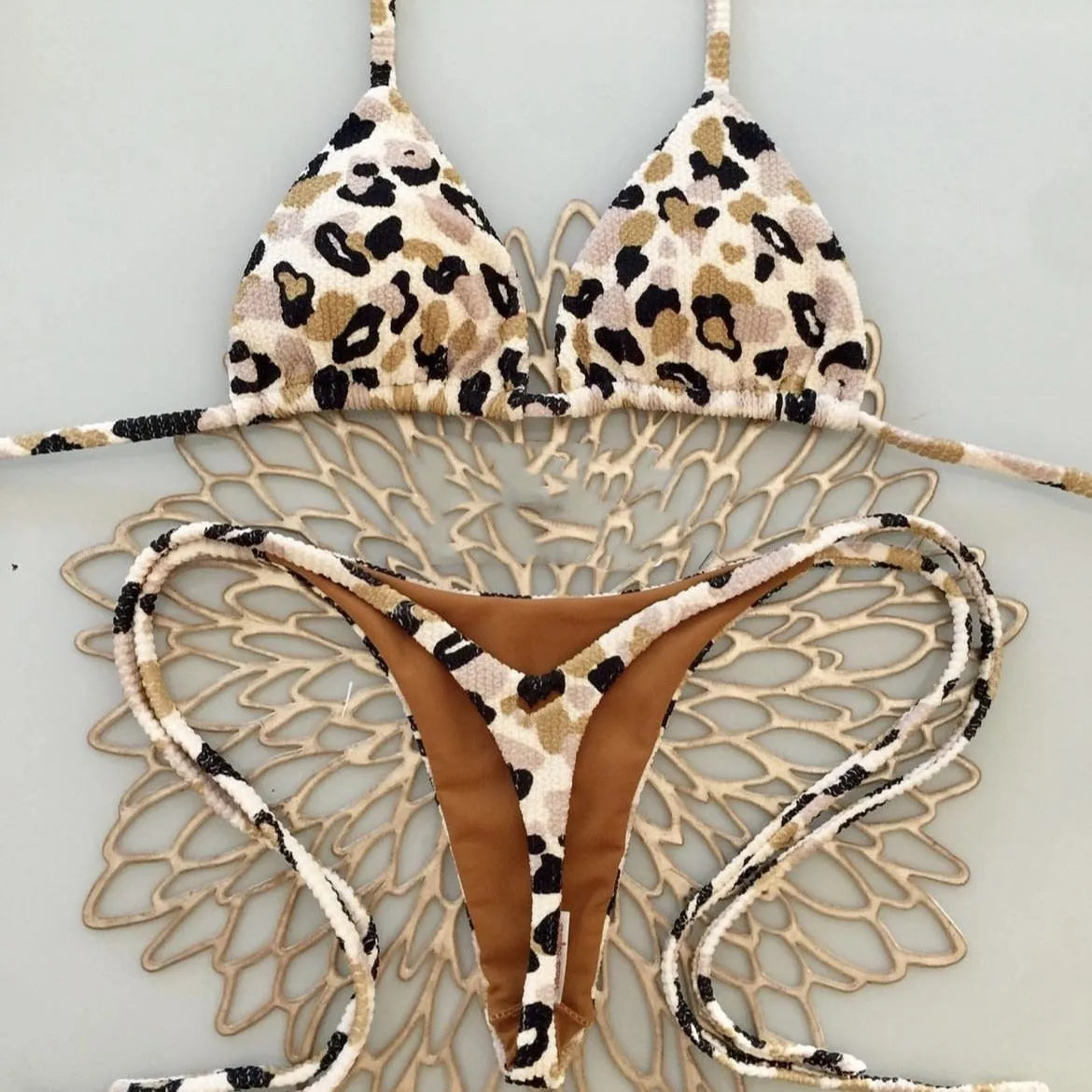 Women's printed bikini swimsuit in briefs style with quick-dry fabric.