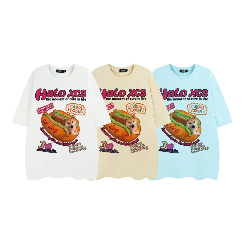 A white loose-fit cotton T-shirt with a large cartoon print of a hamburger dog.