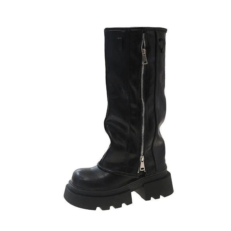 Women's black platform muffin pants Martin boots with high socks and a square rubber heel.