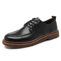 Men's black and brown leather casual shoes with round toe and flat rubber soles