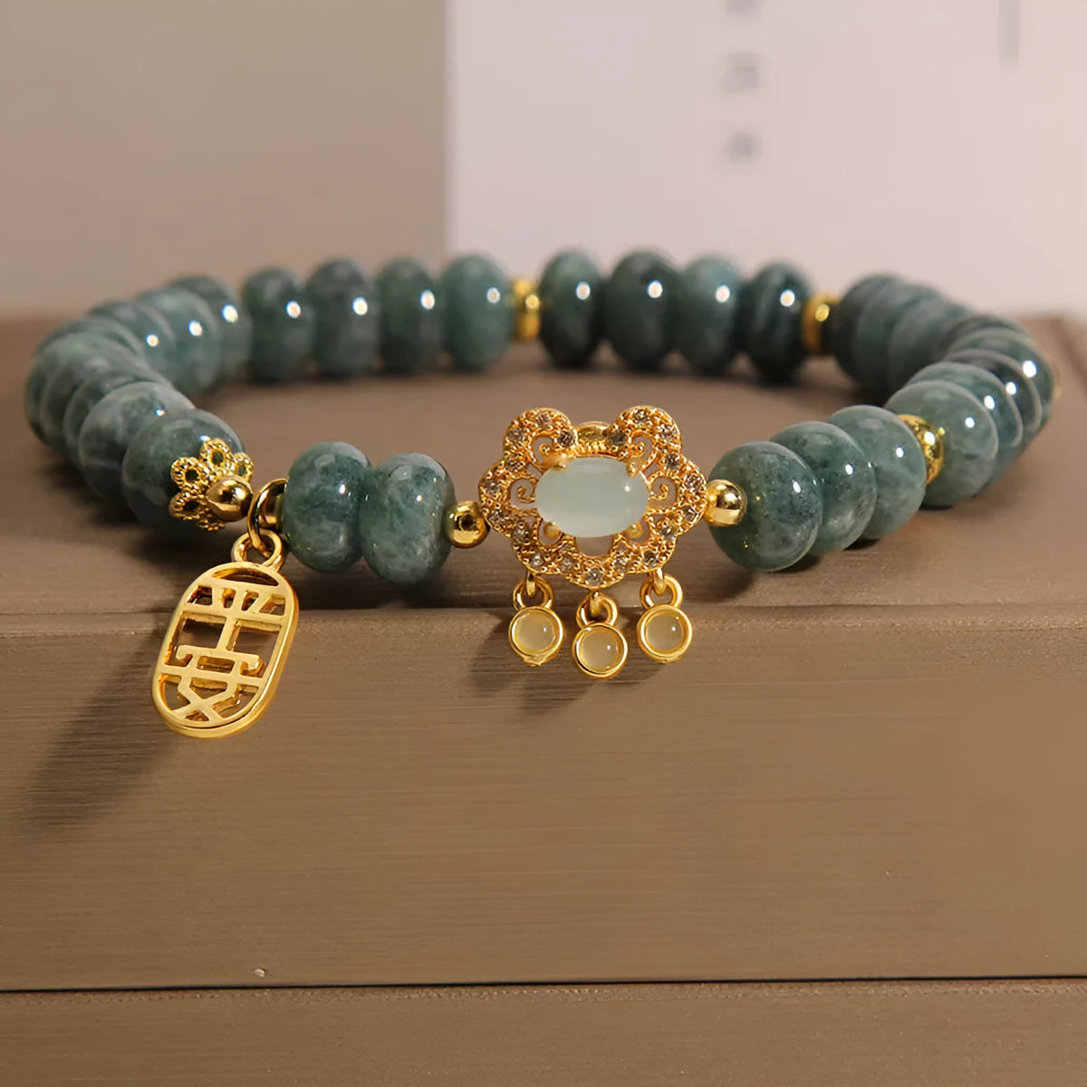 Natural emerald jade bracelet with abacus beads design and safety lock closure