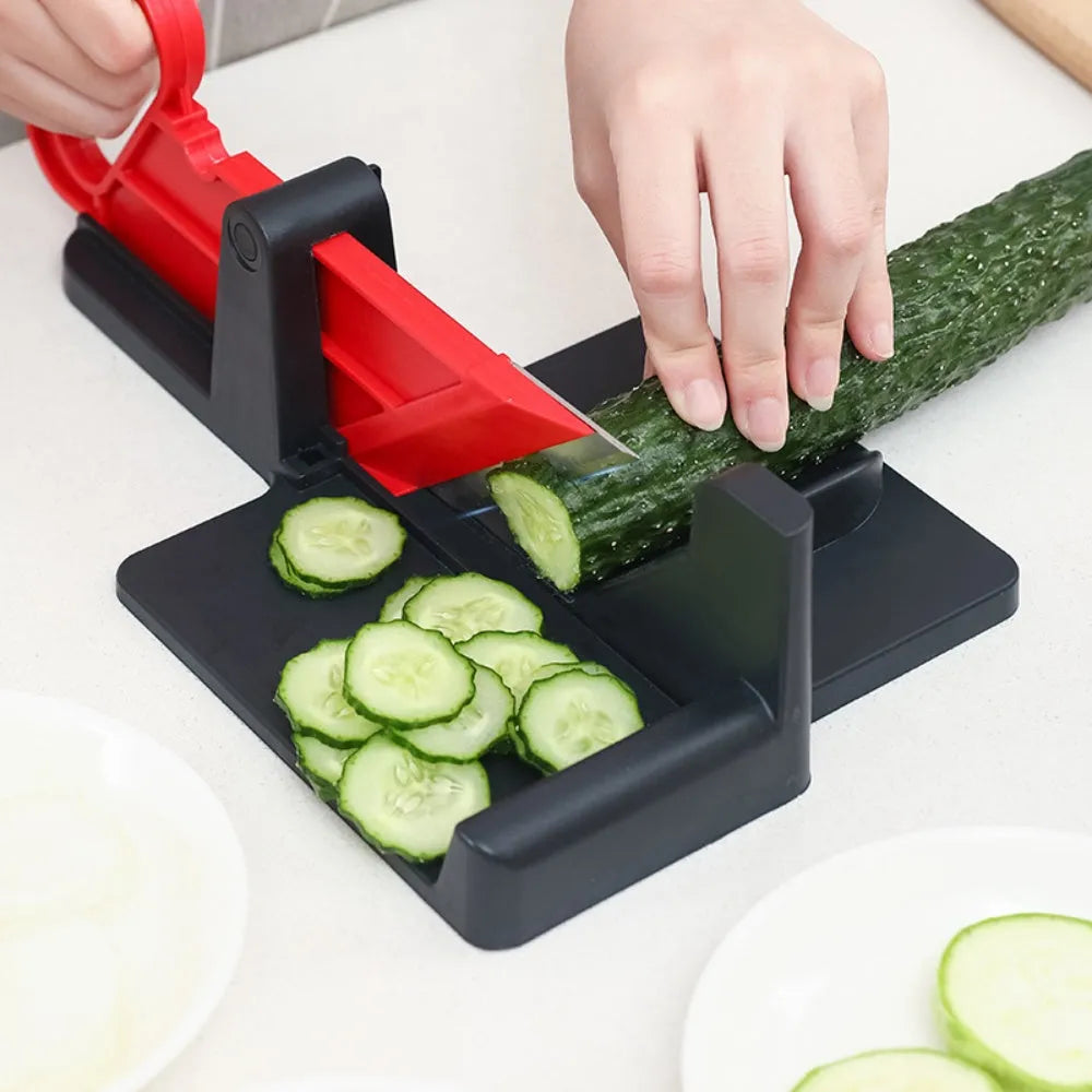 Green and red modern vegetable cutter with stainless steel blades for slicing carrots and potatoes