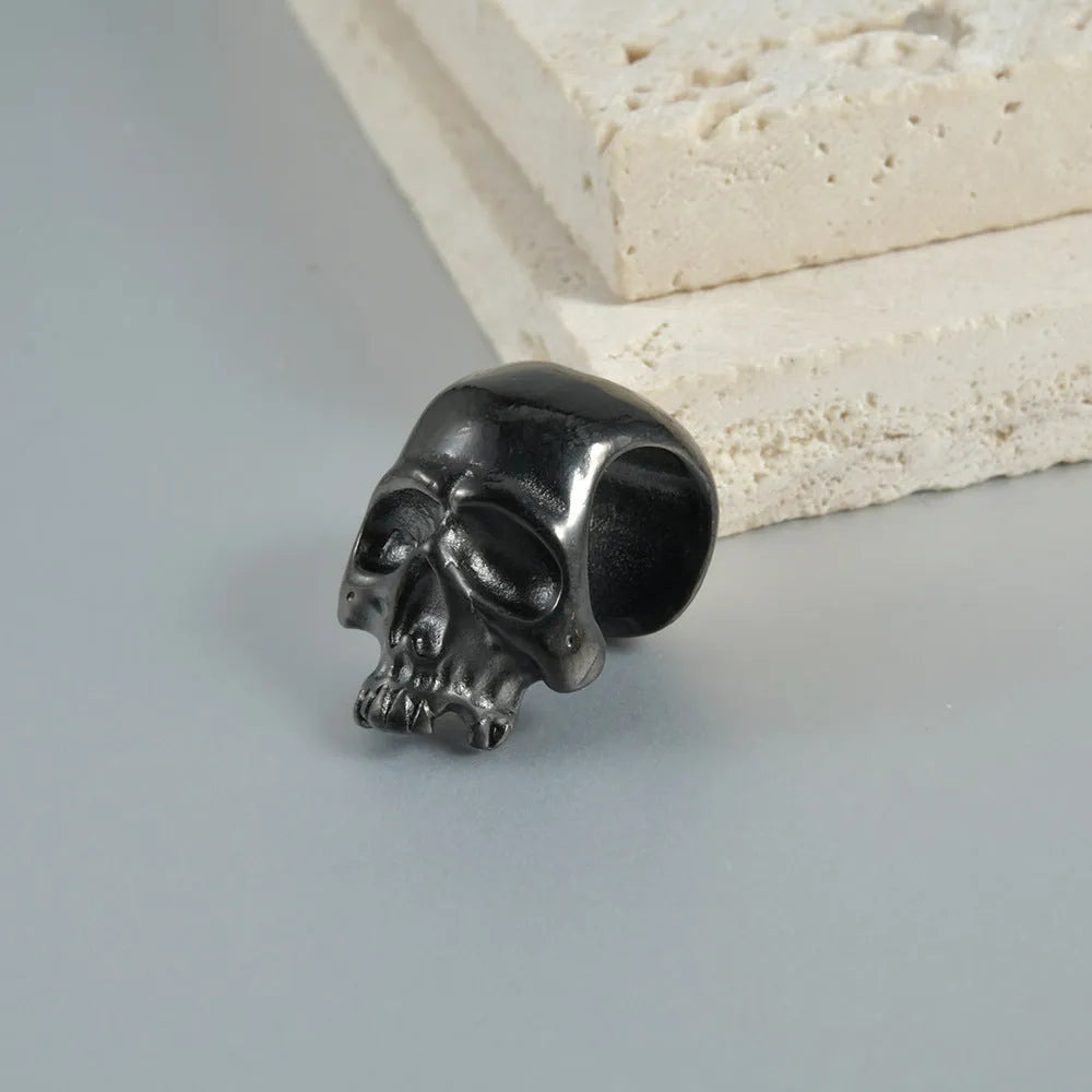 Stainless steel hollow skull Buddha earrings with geometric designs in four colour options