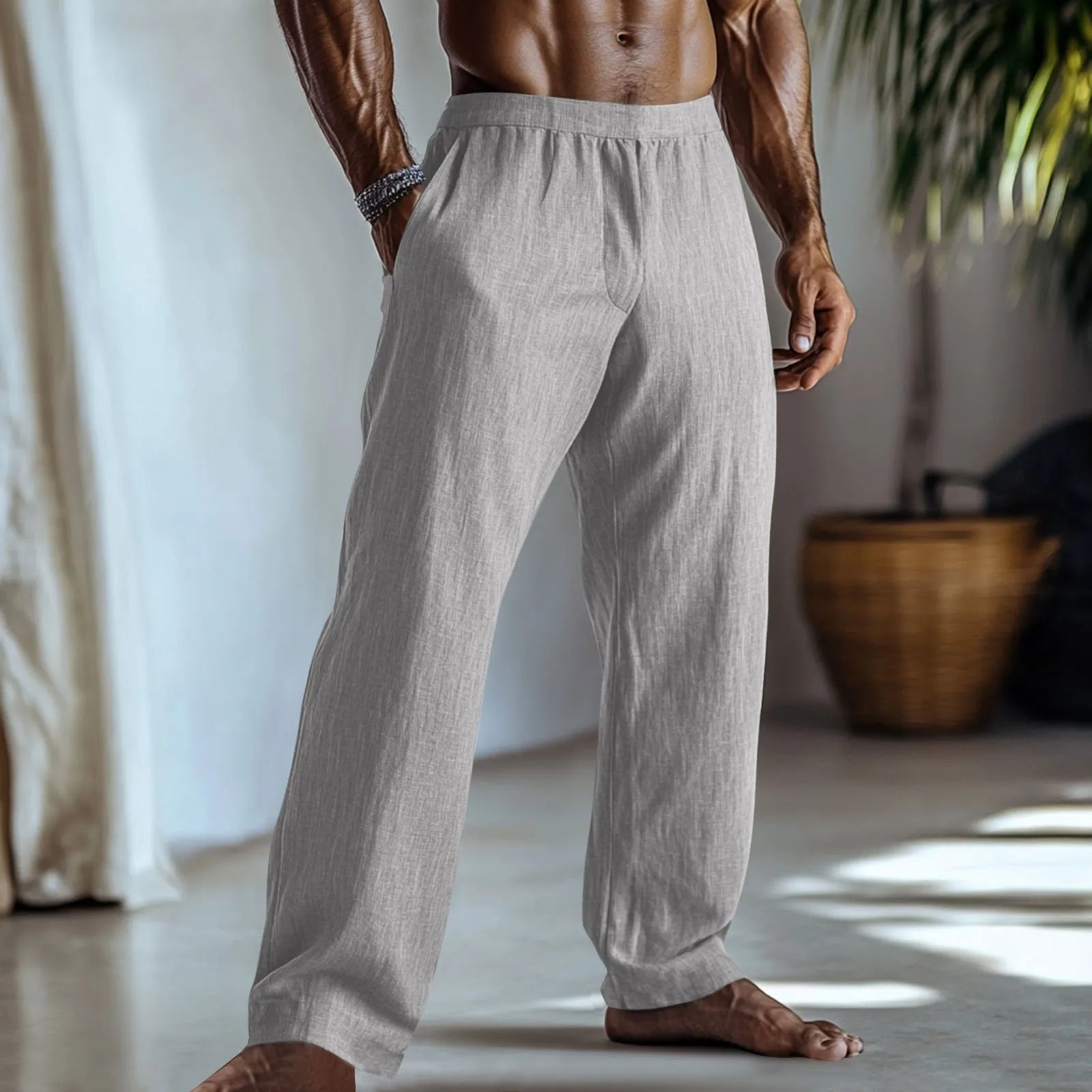 Straight leg cotton linen trousers in light green colour showing front view with pockets