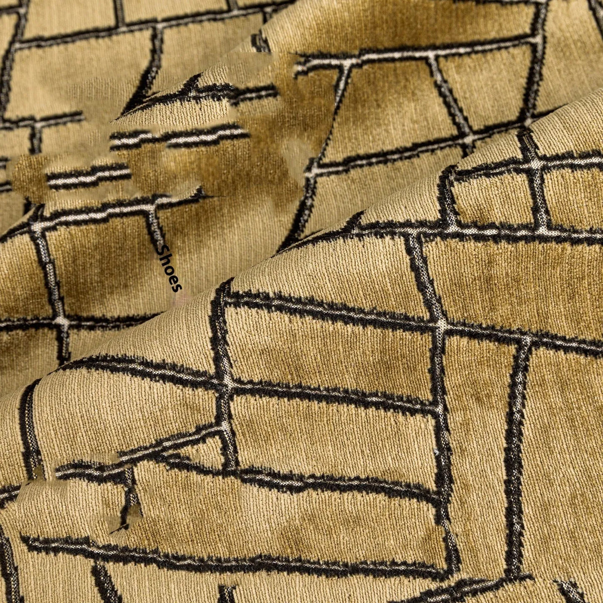 Geometric abstract cushion cover in local tyrant gold colour showing three size options