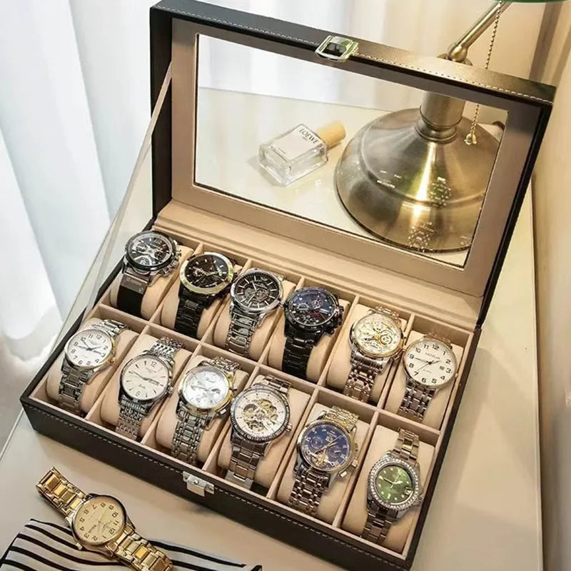 Leather watch storage box with clear dustproof lid showing multiple watch compartments