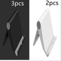 A black PE plastic folding stand holding a mobile phone at an angle, showing its compact design.