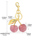 Zinc alloy cherry blossom key ring pendant in pink or red colour options