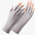 Thin beige women's ice silk sunscreen gloves with UPF50 protection on a hand.