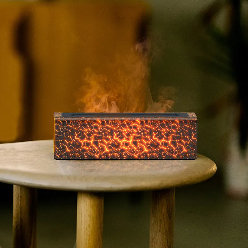Square creative lava flame atmosphere humidifier and aroma diffuser with colourful LED lights on a desktop.