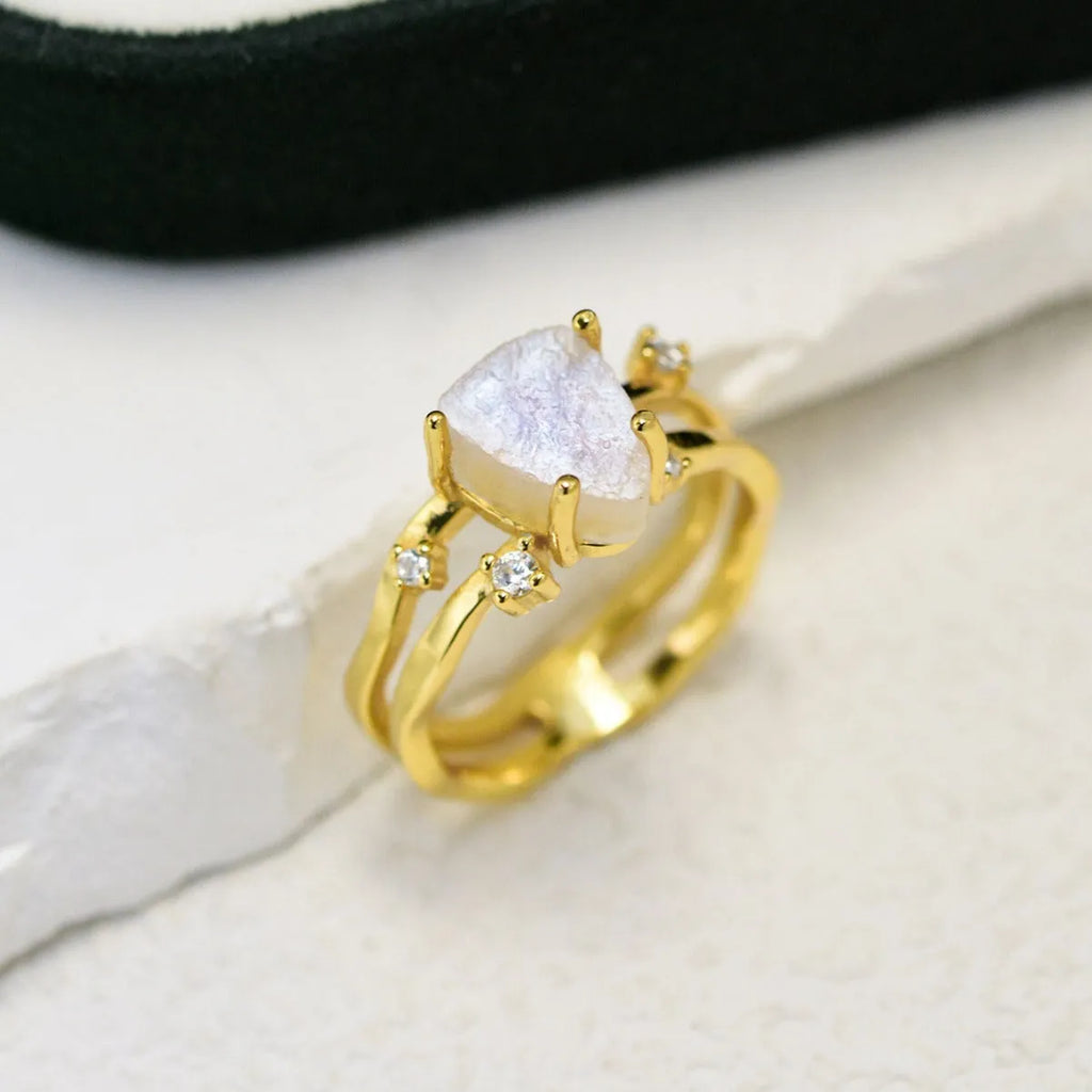S925 sterling silver moonstone ring with geometric triangle shape on jewellery display