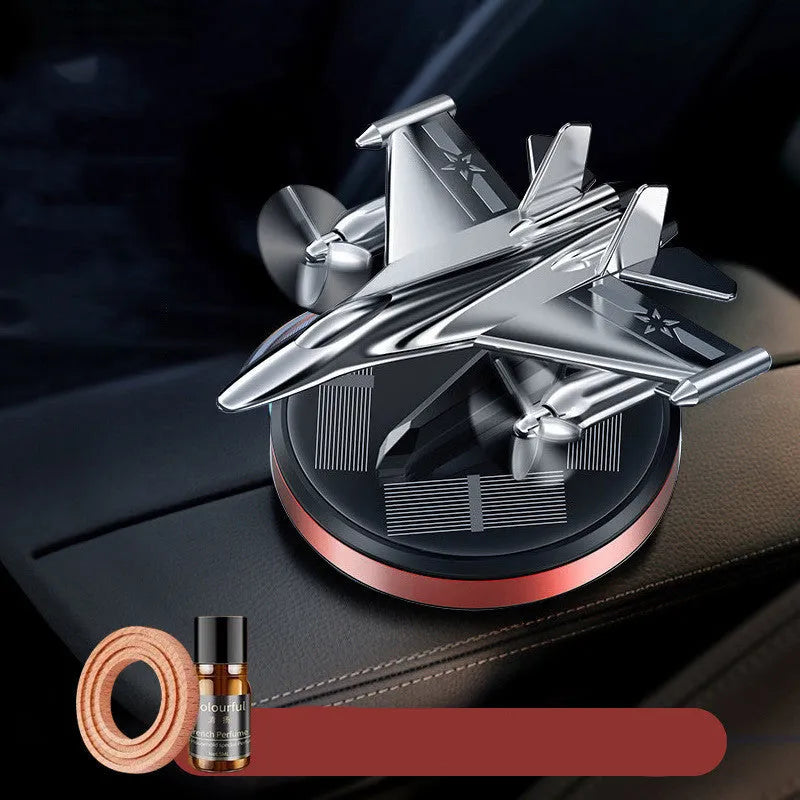 Solar powered rotating fighter jet perfume ornament in aluminium alloy with essential oil