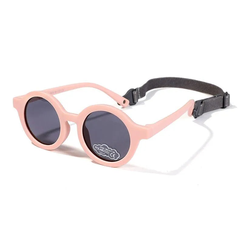 Soft silicone round-frame sunglasses for babies and toddlers aged 0-3 years with polarised UV400 lenses.
