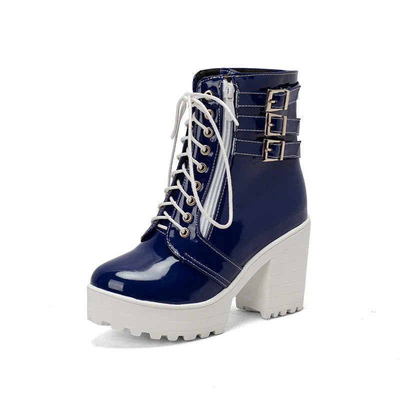 Women's black chunky heel ankle boots with front lace-up and round toe on a waterproof rubber sole.