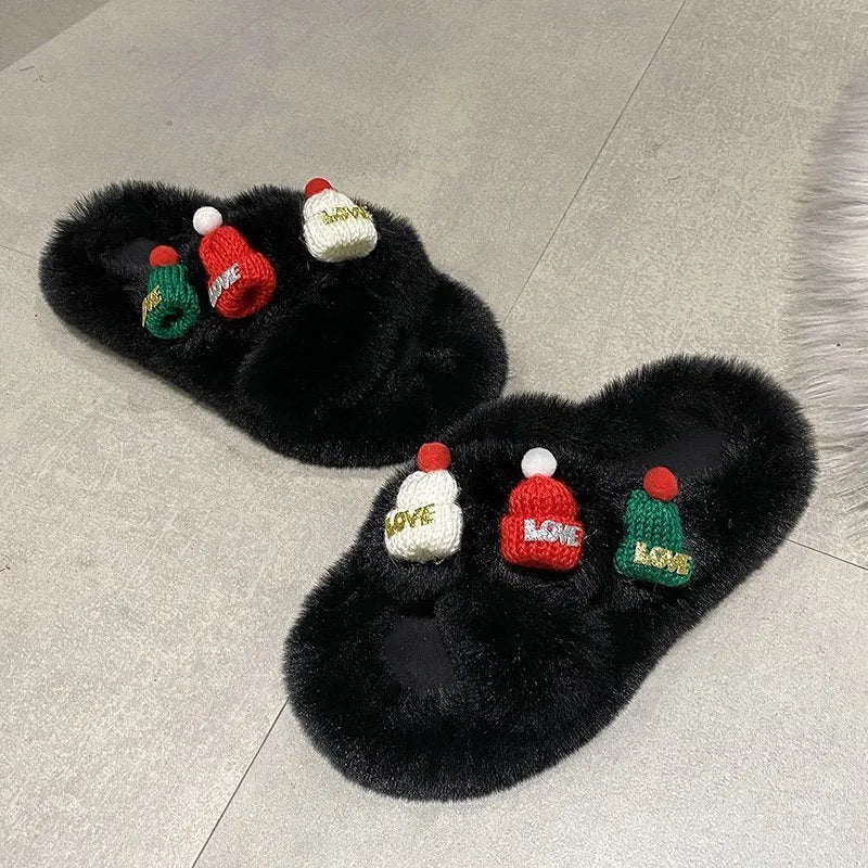 Women's Christmas hat themed slippers in faux plush with a rubber sole and cotton lining.