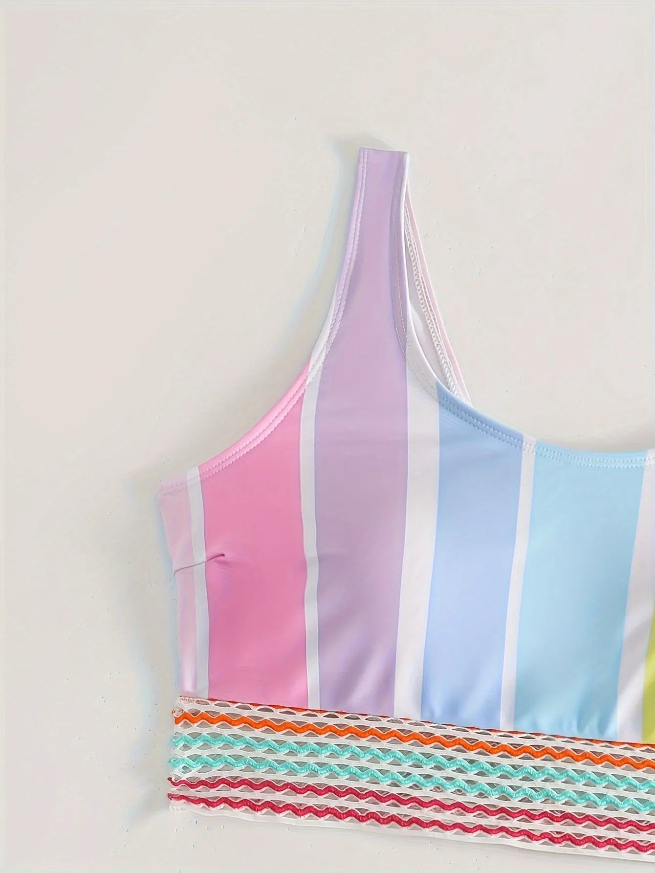 Women's striped bikini swimwear set with a sporty casual design