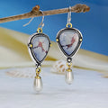 Retro blue drop earrings with geometric design featuring synthetic opal and pearl details