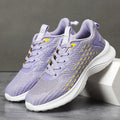 Women's lavender purple Flyknit running shoes with mesh lining and striped pattern for athletic use
