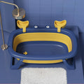 Blue foldable portable pet bathing tub for small dogs and cats on a non-slip base.