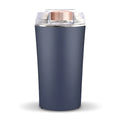 Blue compact electric mini flour mill and spice grinder on a kitchen countertop