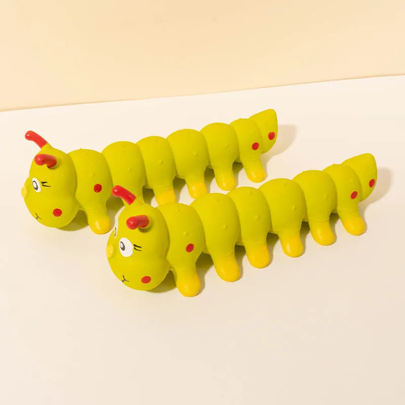 Yellow rubber caterpillar dog squeaky toy measuring 25.5 cm long
