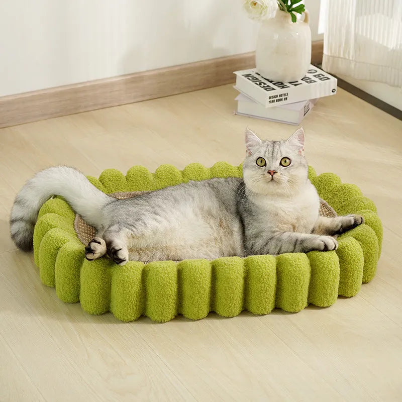 Green oval sisal cat scratch pad bowl measuring 650mm functioning as cat scratcher and bed