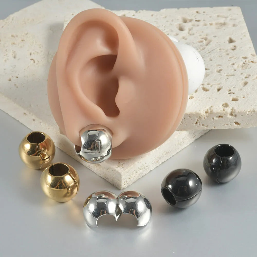Stainless steel hollow skull Buddha earrings with geometric designs in four colour options