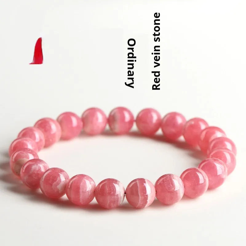 Women's geometric crystal bracelet with Longevity Lock in natural red rhodochrosite stone.