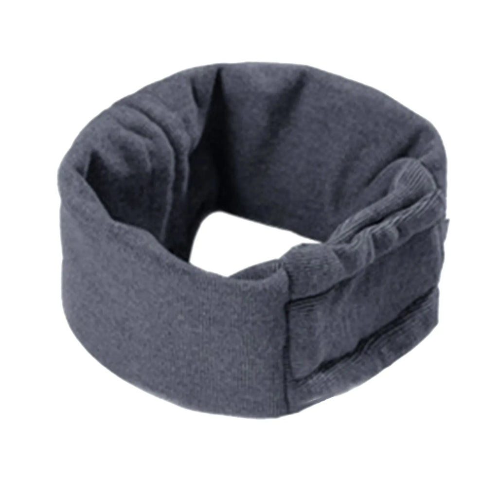Dog wearing black calming hoodie covering ears with hair protection and scarf function