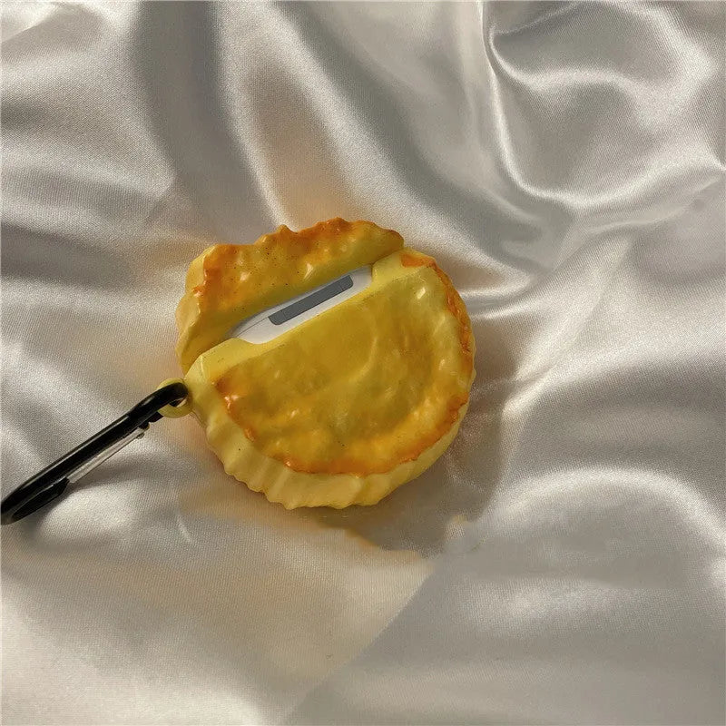 Yellow silicone AirPods case with butter cookie design, compatible with AirPods 1, 2, Pro, and 3.