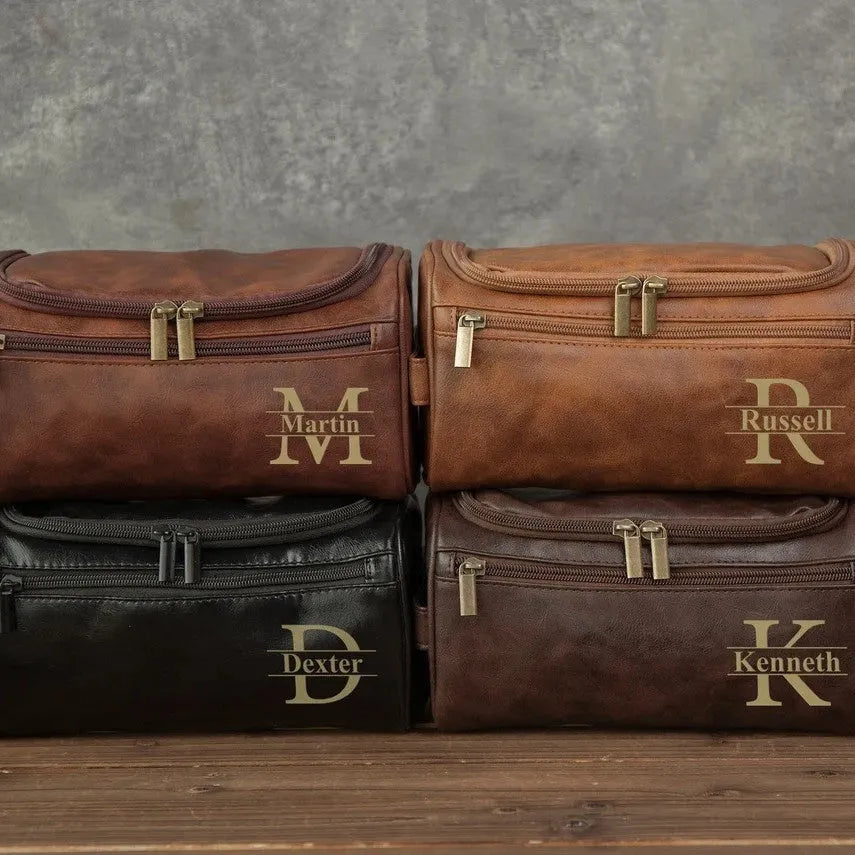 Men's black PU leather travel bag with seven compartments open, showing internal organisation