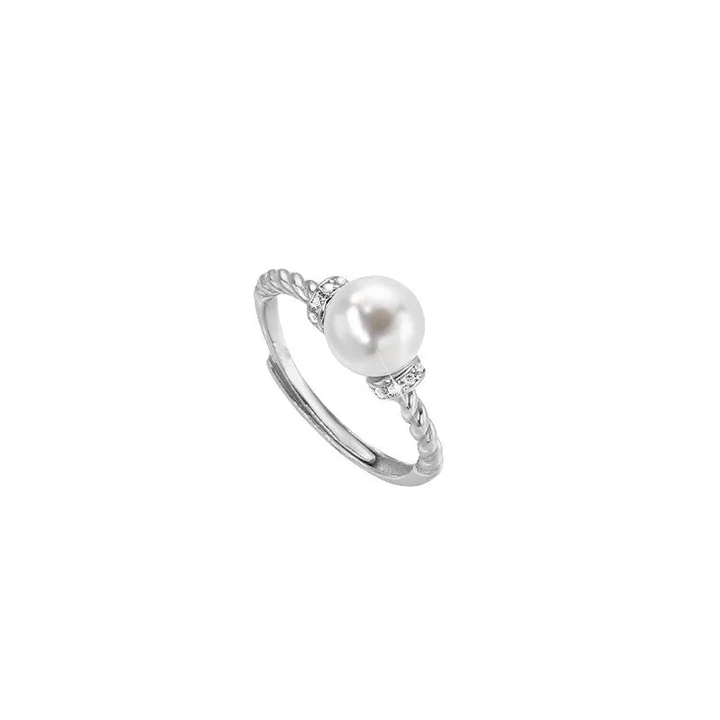 Antique twist pearl ring with geometric design and adjustable copper band