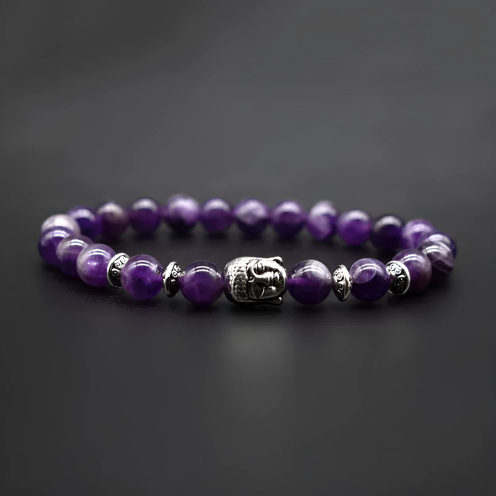 Handmade amethyst bead bracelet with a choice of tiger eye, black agate, pink crystal, or green gold Buddha head charm.