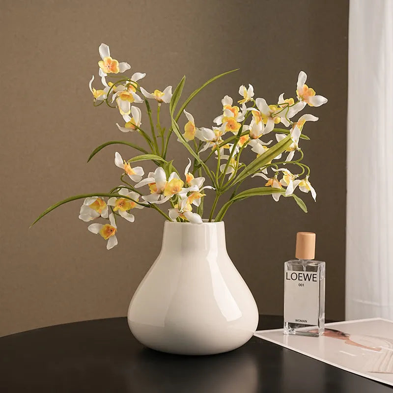 Ceramic round belly French decorative vase with artificial orchid flowers in black or white colour options