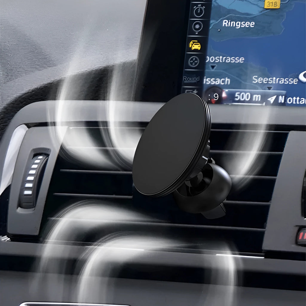 Black aluminium alloy magnetic suction car air vent mobile phone holder mounted on a central control vent.