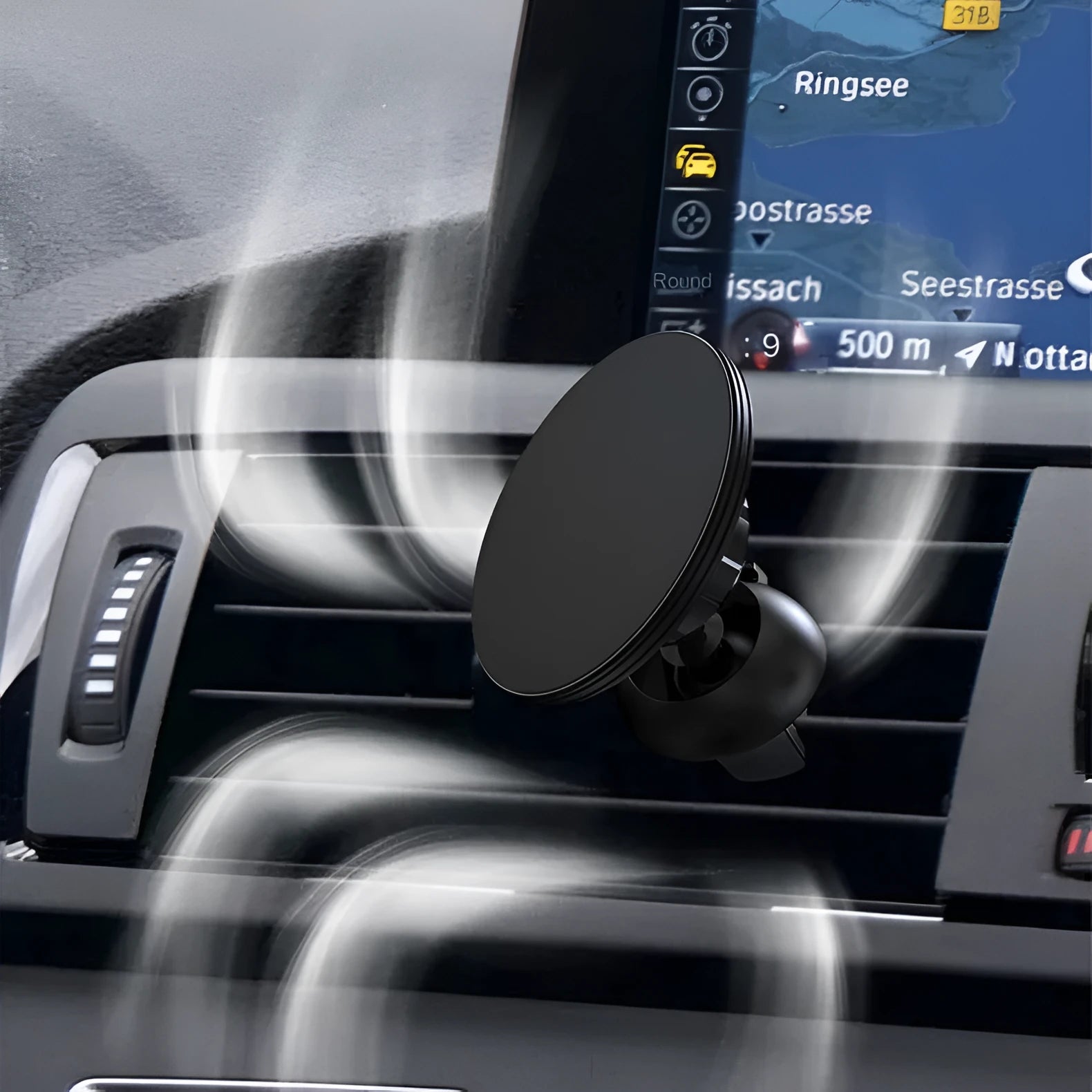 Black aluminium alloy magnetic suction car air vent mobile phone holder mounted on a central control vent.